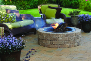Brick fire pit in a paver patio