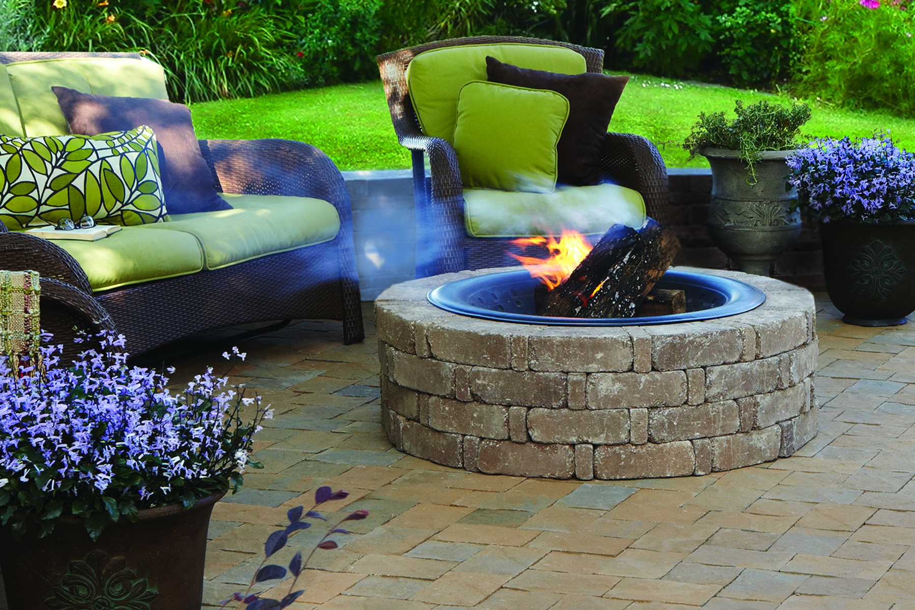 Brick fire pit in a paver patio