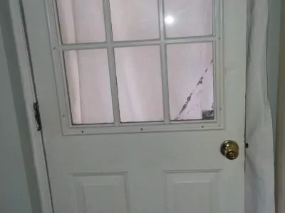 Steel door with plastic grille