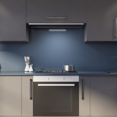 Blue kitchen with gray countertops