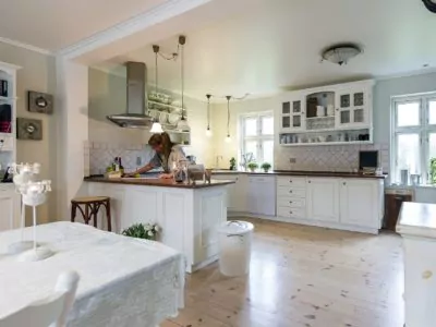 Woman cleaning kitchen