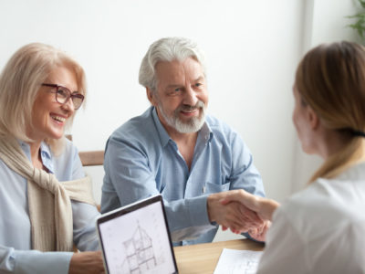 Woman and man buying a home