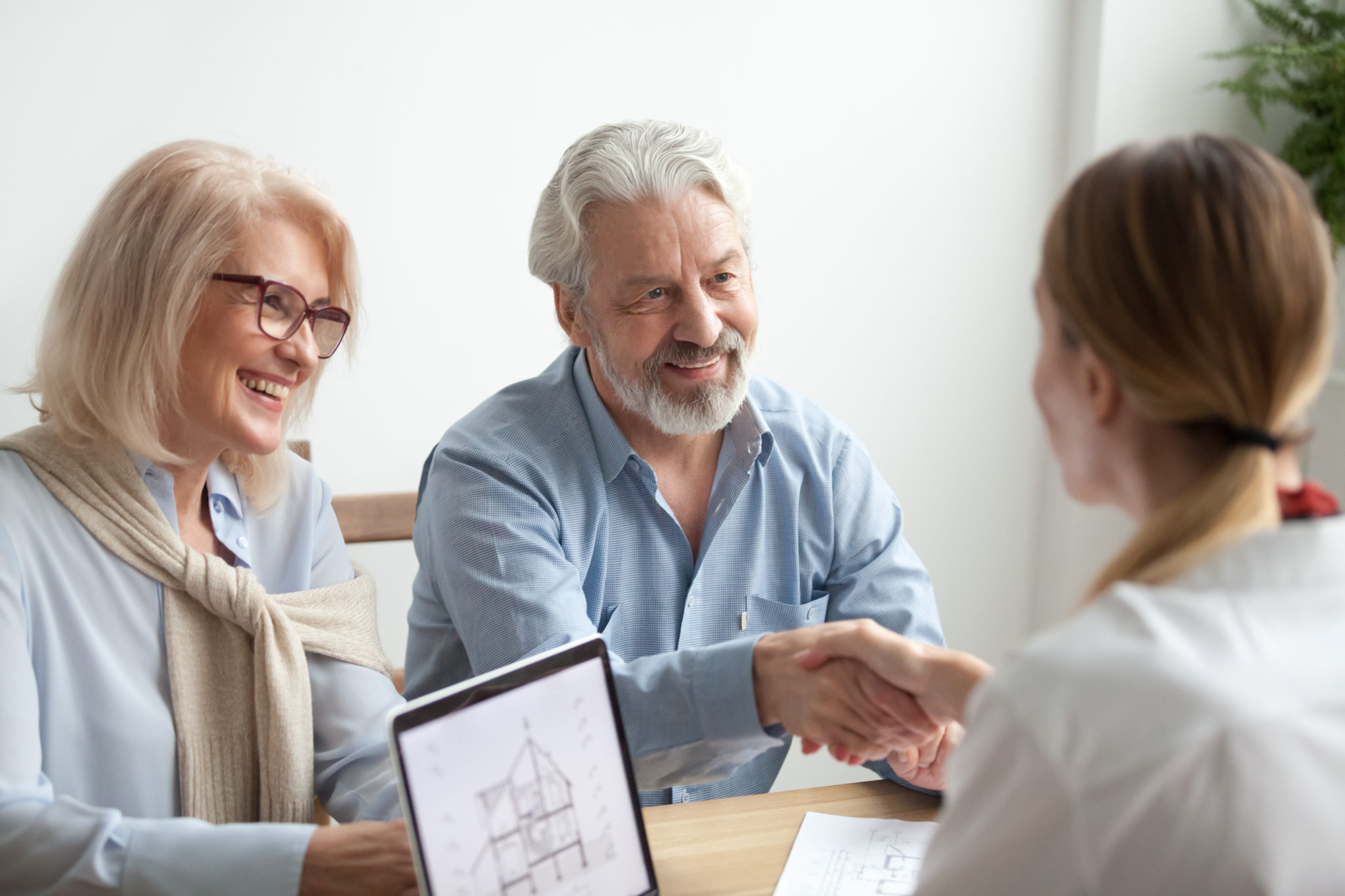 Woman and man buying a home