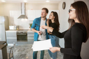 Realtor showing couple a home to buy