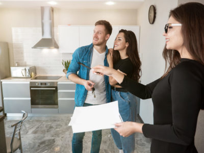 Realtor showing couple a home to buy