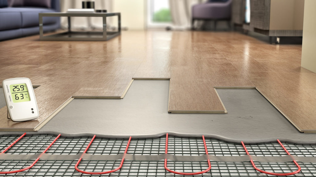 Laminate panels on floor with underfloor heating