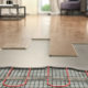 Laminate panels on floor with underfloor heating