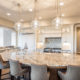 Kitchen with Island, Sink, Cabinets, and Hardwood Floors