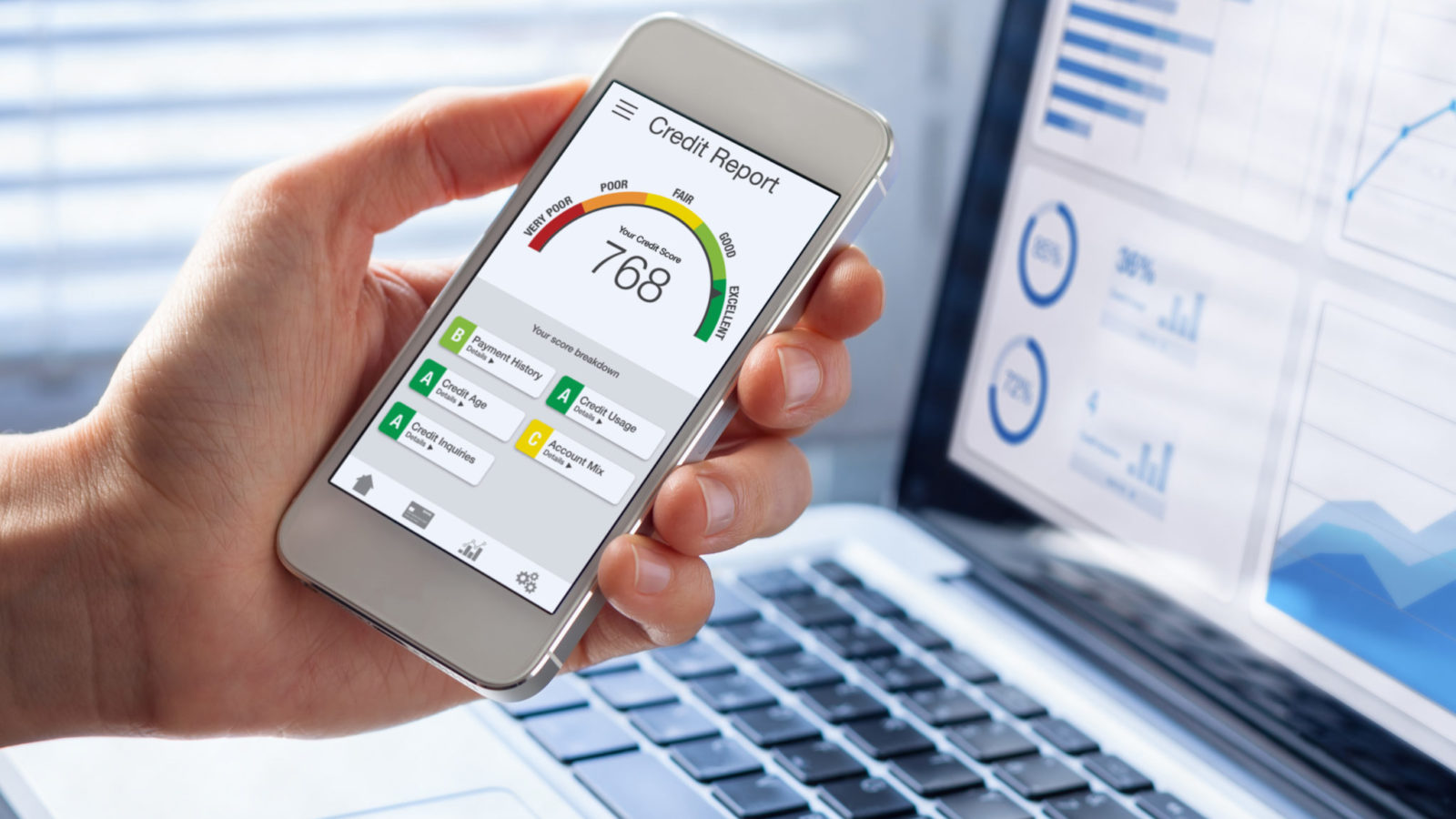 Credit Report with Score rating app on smartphone screen showing credit score