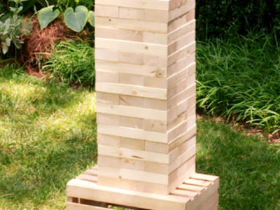 Giant Jenga game in a backyard