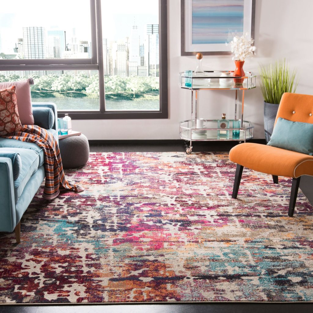 Colorful area rug in a bedroom