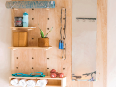 Pegboard mirror on a wall.