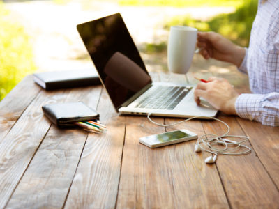 Man working outside on computer