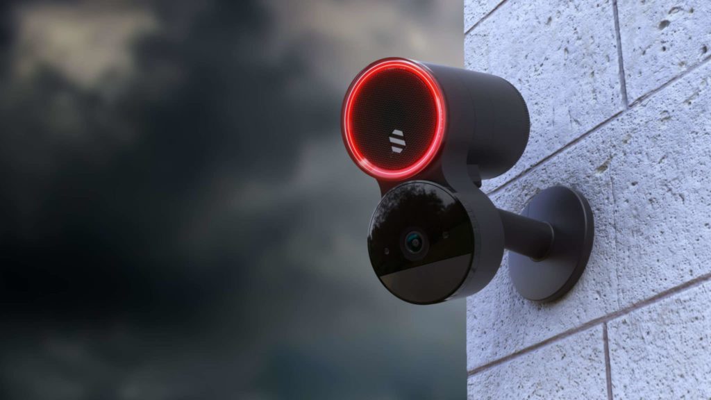 Security camera on an exterior wall.