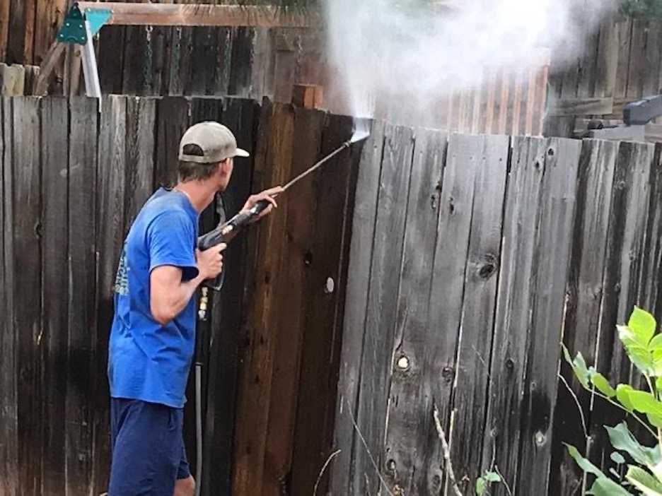 Pressure washing the fence