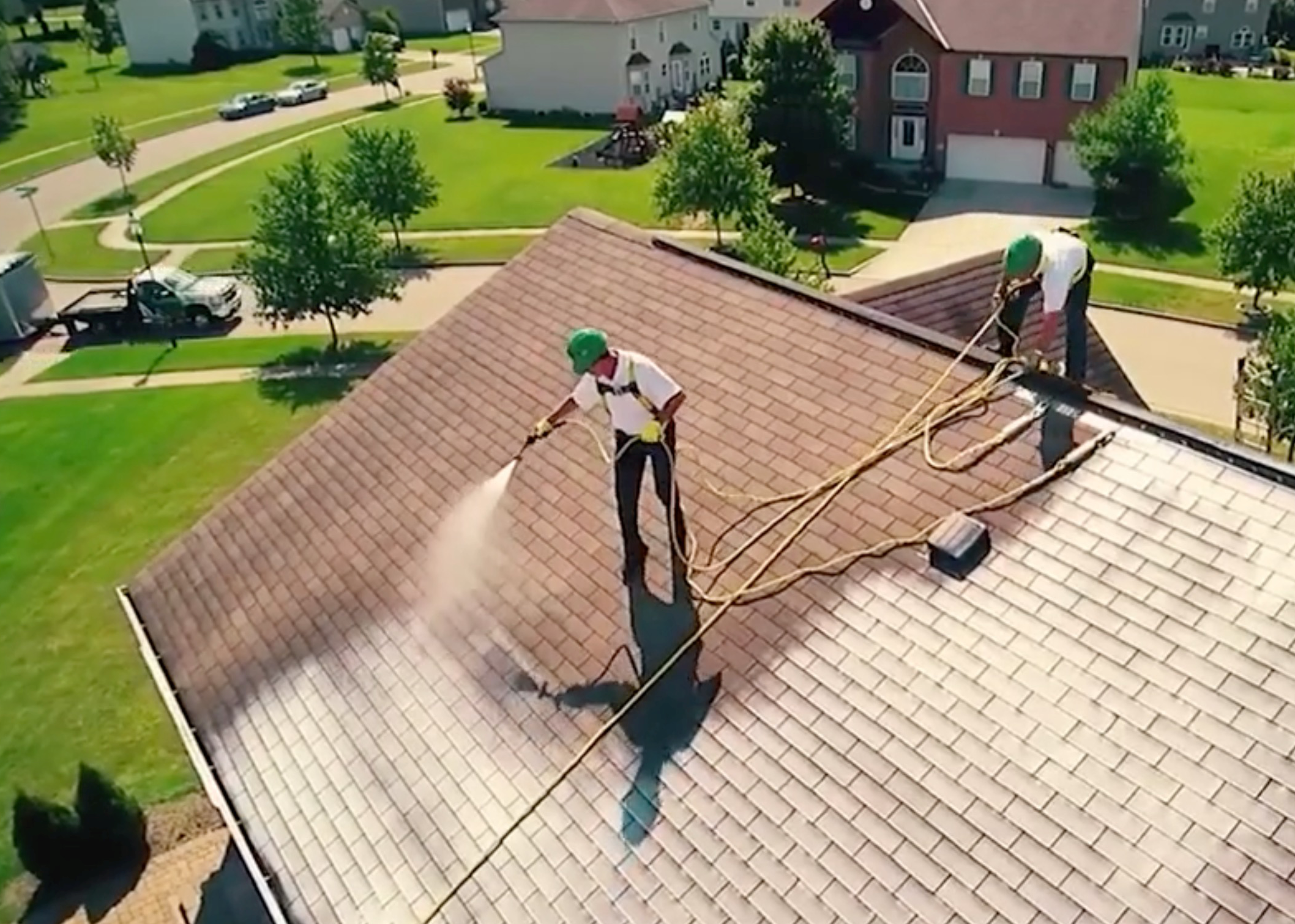 RoofMaxx rejuvenation treatment being applied.