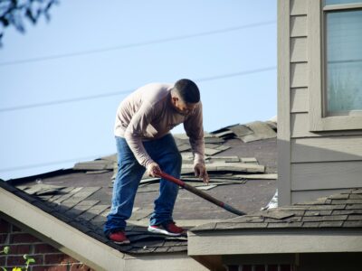Removing old roof shingles
