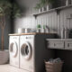 Interior of a gray laundry room with a sink, two washing machines, a potted tree, and some shelving