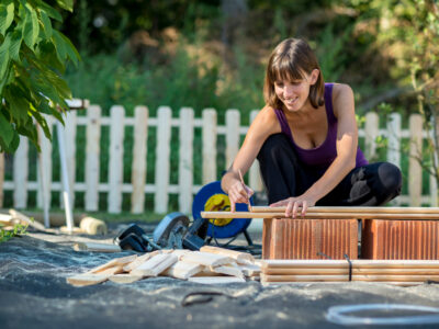 Young tradesperson building a backyarding project