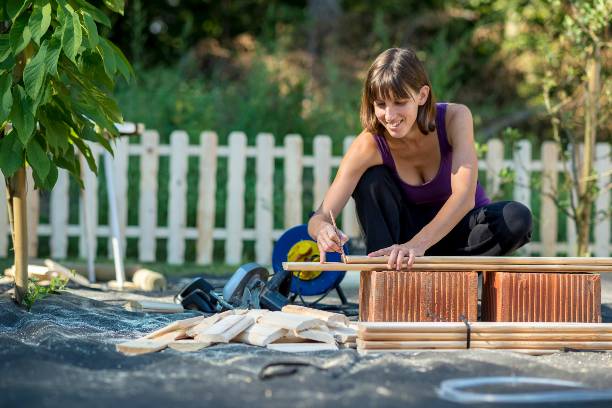 Young tradesperson building a backyarding project