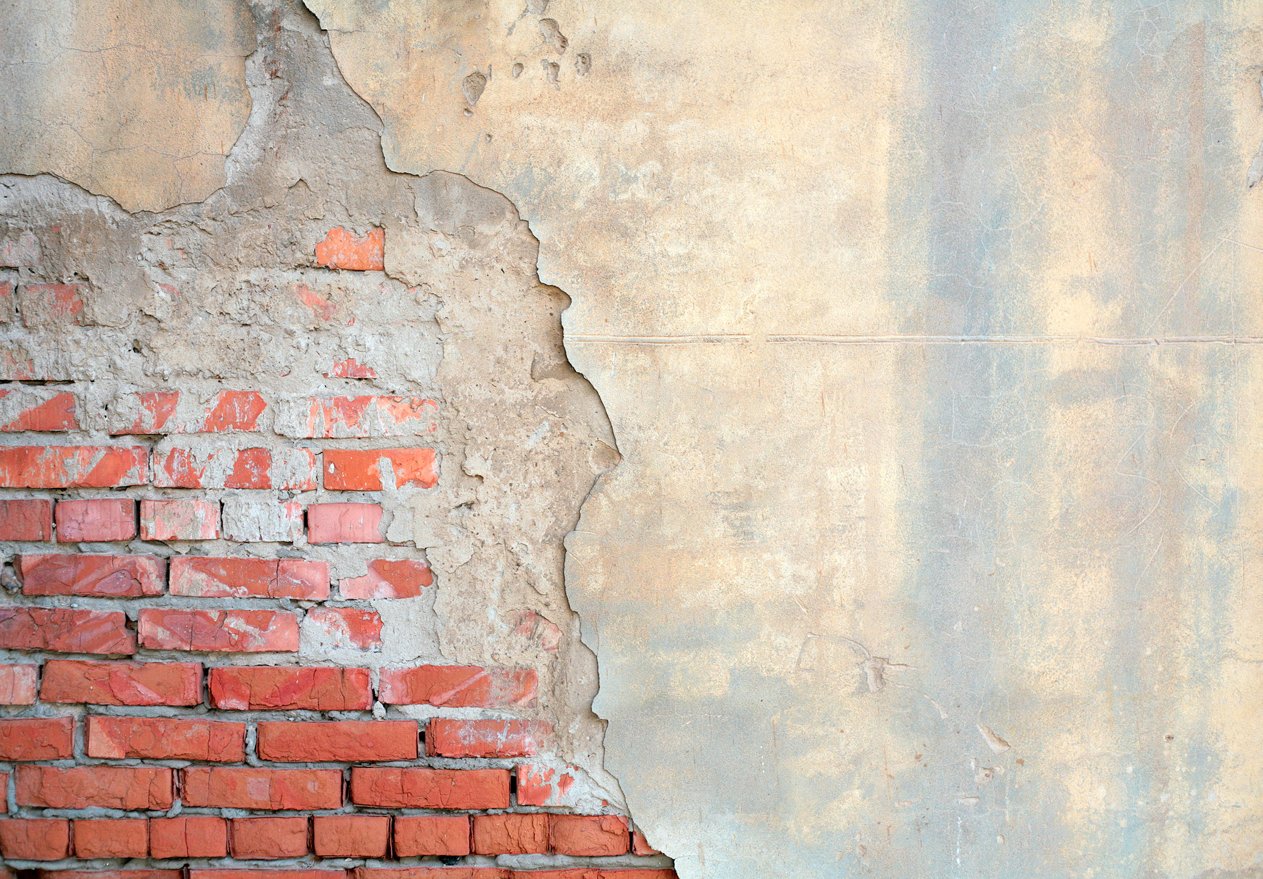 Plaster and brick exterior wall