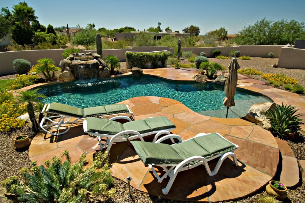 Landscaping can add to the cost of building a pool.