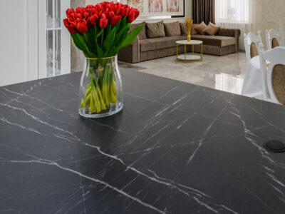 Luxurious black marble countertop on kitchen island created by Daich Marble Dream kit